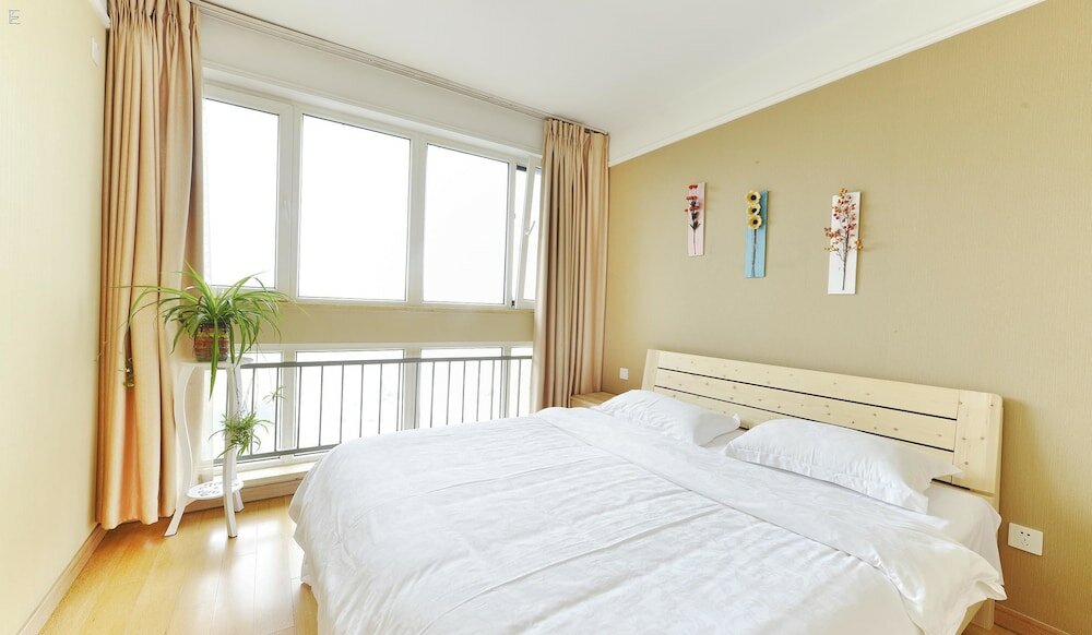 Фото Wanke City International Apartment