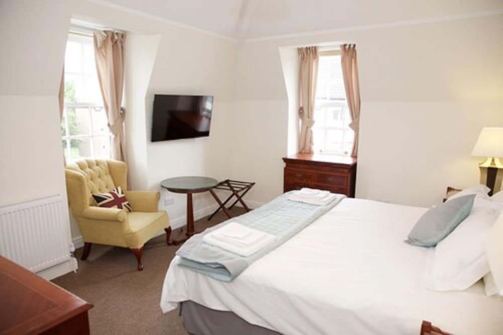 Фото The Captain Cook Hotel