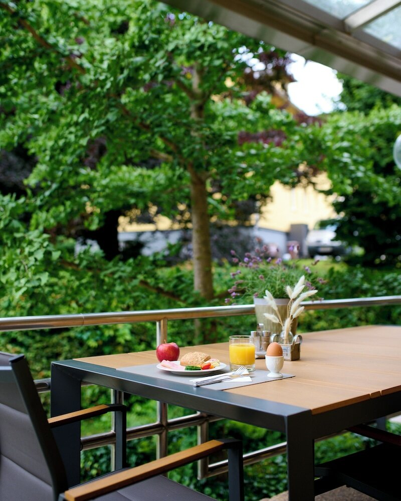 Фото Ferienwohnungen - Appartements Pension Zollner