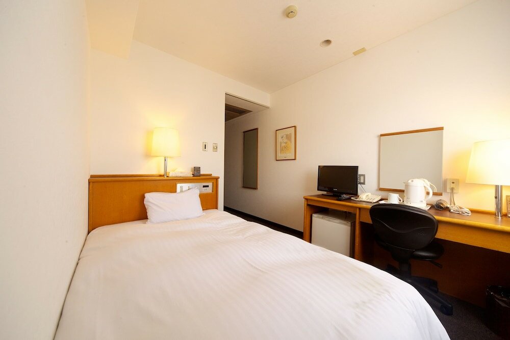 Фото Kochi Sunrise Hotel