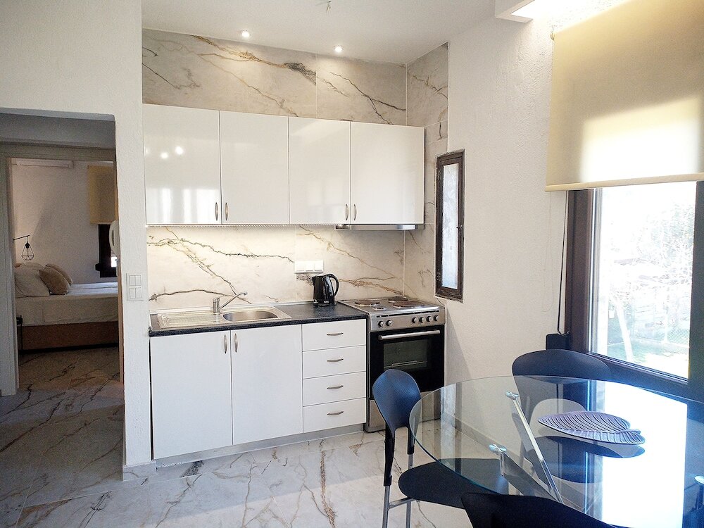 Фото Salonikiou Beach Deluxe Apartments