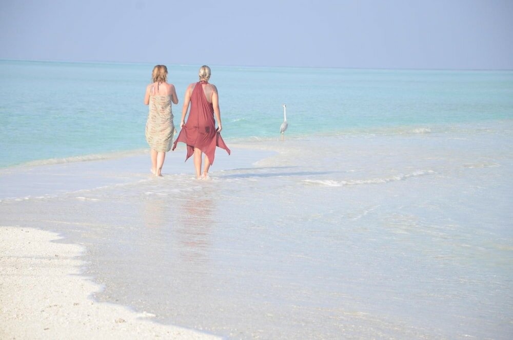 Фото Rasdhoo Coralville Hotel