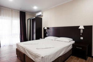 Отель Амиго