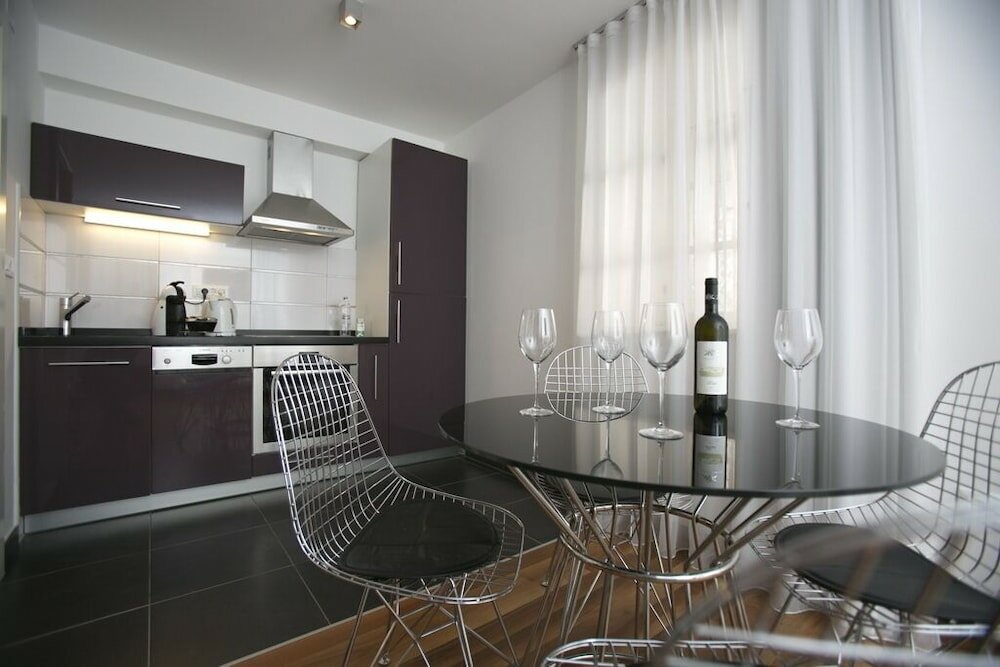 Фото Divota Apartment Hotel