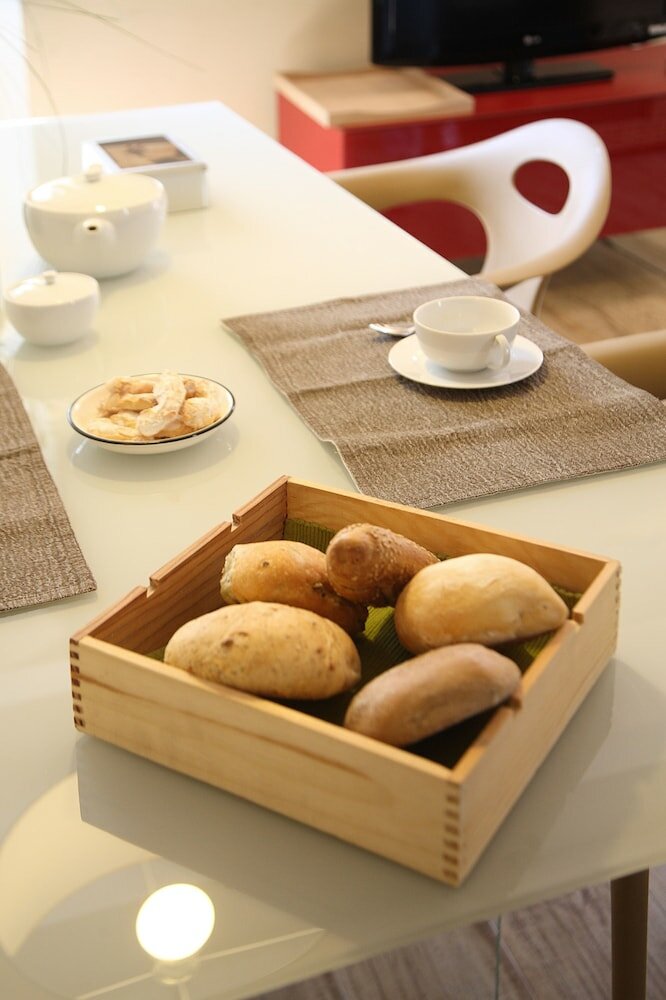 Фото Corte San Luca Apartments