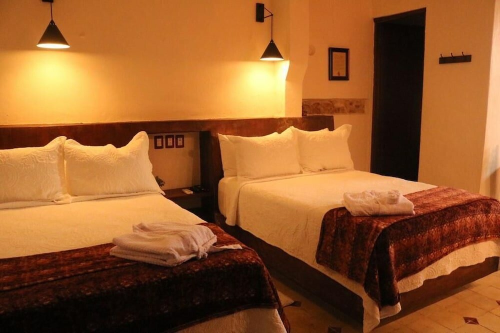 Фото Kuxtal Hotel Boutique