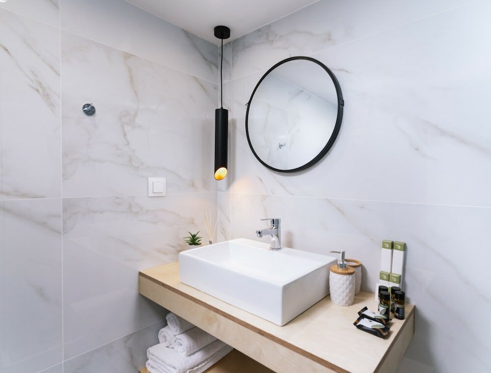 Фото Ermis Luxury Suites & Apartments