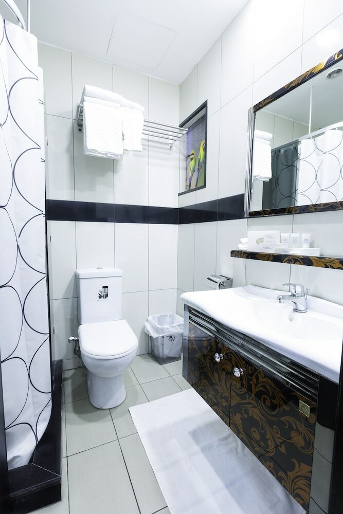 Фото Easy Inn Hotel Suites