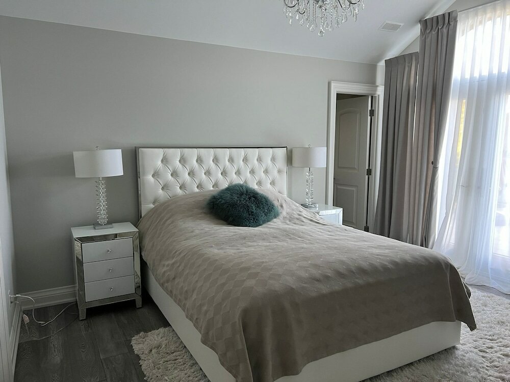 Фото New Waterfront Mansion by Simply Comfort