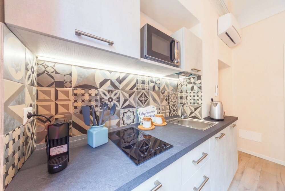 Фото Charm Of Ortigia Central Flat