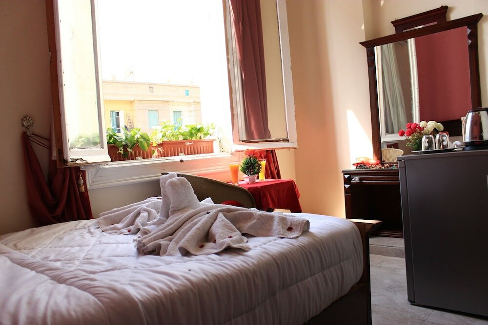 Фото Victory Of Downtown Hotel