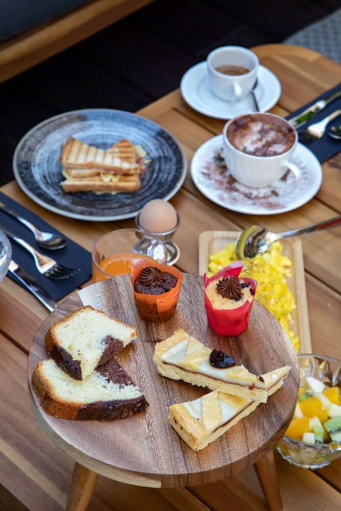 Фото Tridente Suites