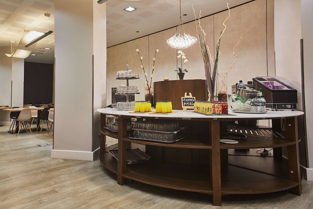 Фото Hotel Silken Ciudad Gijon