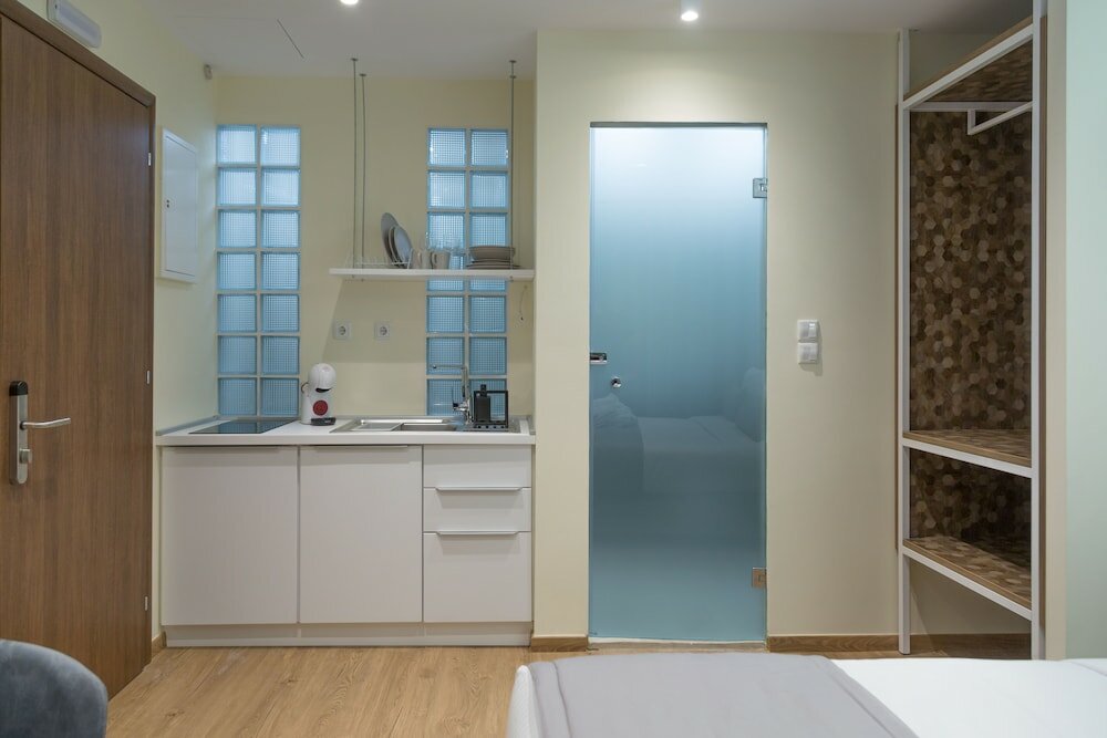 Фото Suites Syngrou Fix