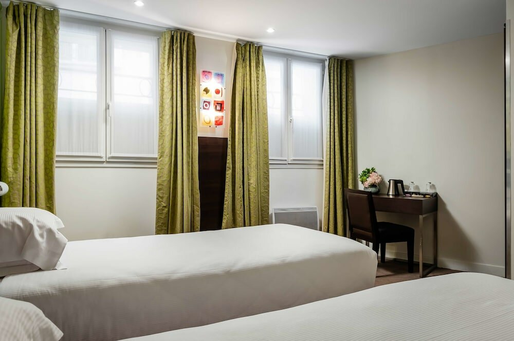 Фото Hotel Arc de Triomphe