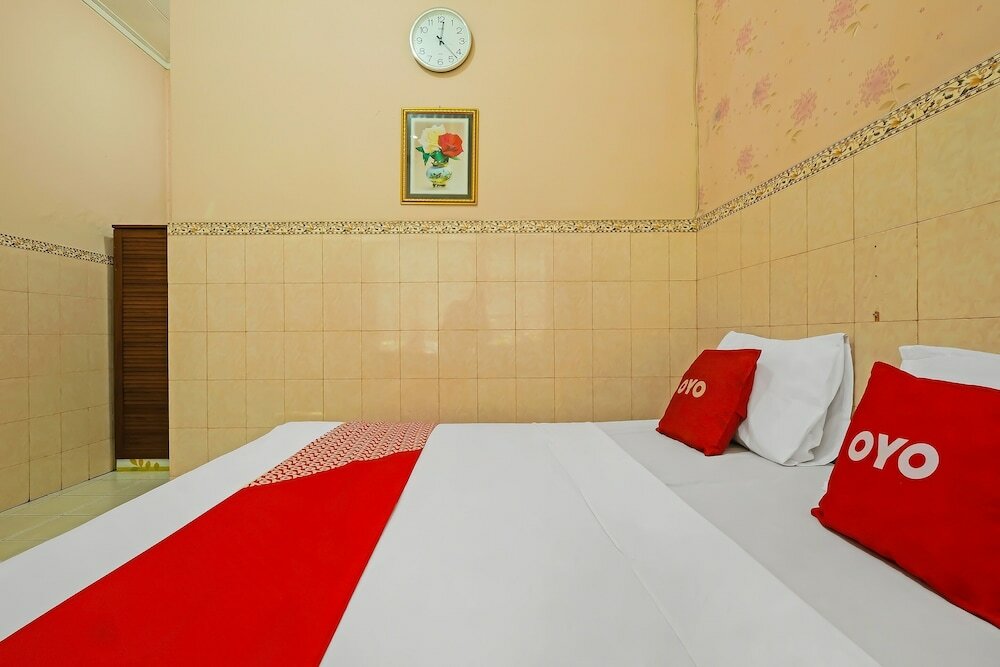 Фото Oyo 92454 Griya Raharja Guest House