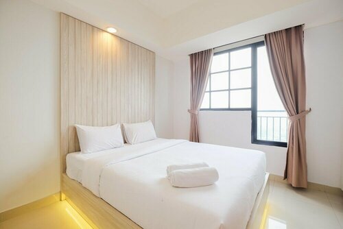 Гостиница Comfortable And Strategic Studio Apartment Evenciio Margonda в Депоке