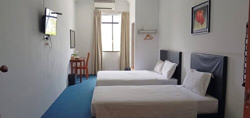 Гостиница Super Oyo 90686 Sianglory Inn в Кота-Кинабалу