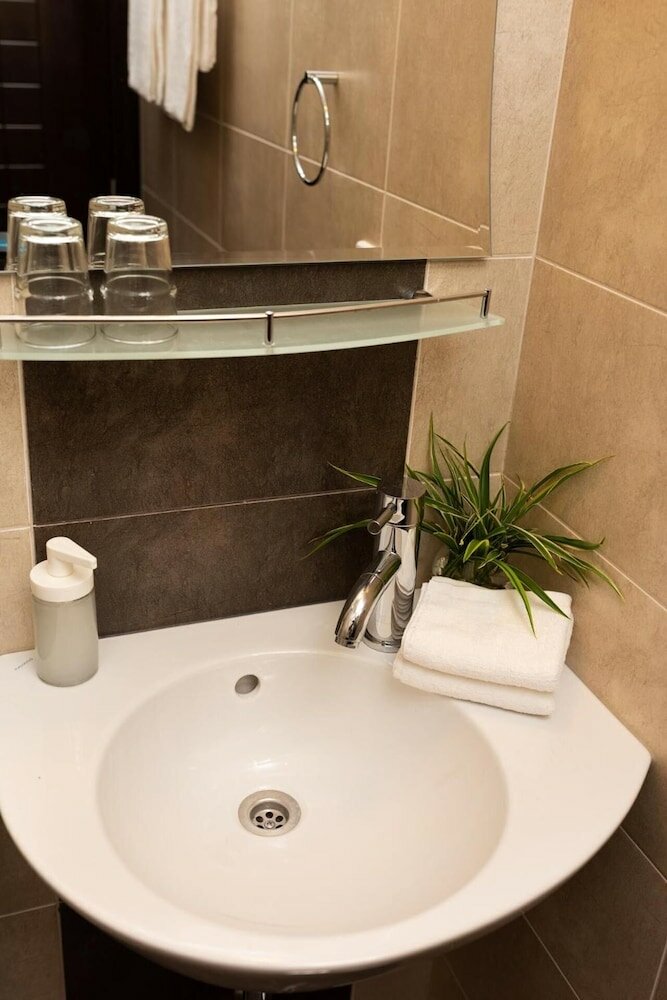 Фото CityHome Aparthotel