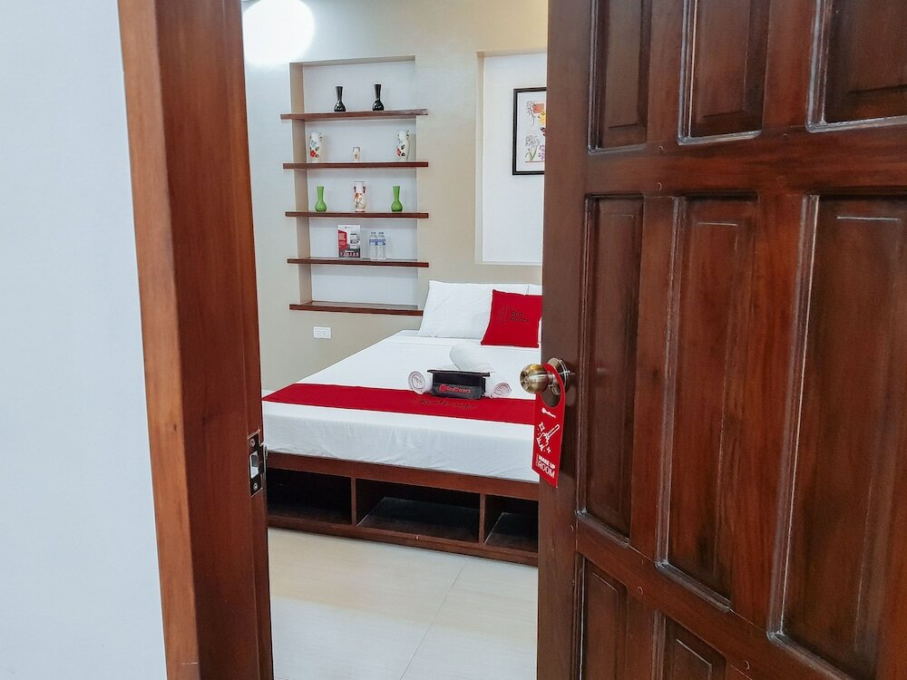 Фото RedDoorz @ Caimito Drive Dampas