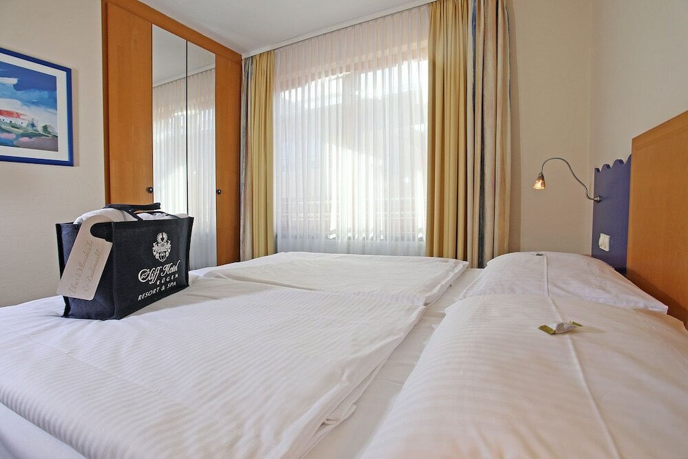 Фото Cliff Wellness Ferienwohnungen Ruegen