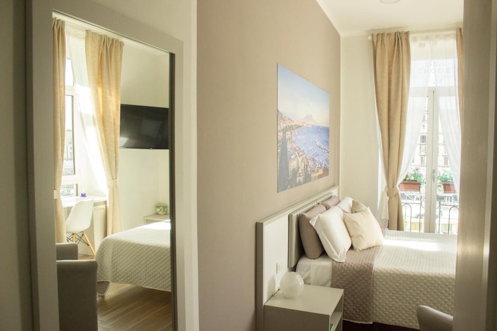 Фото Rooms Stazione Centrale