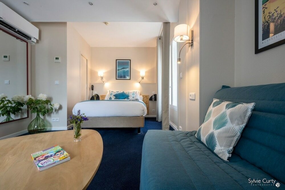 Фото Un Hôtel sur le Port