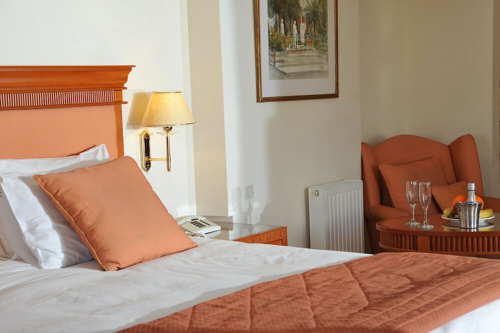 Фото Athens Atrium Hotel and Suites