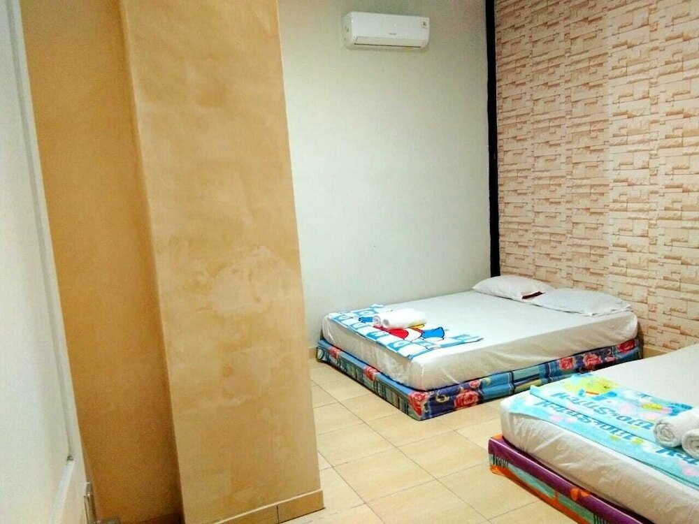 Фото Penginapan Bunar Tunggal