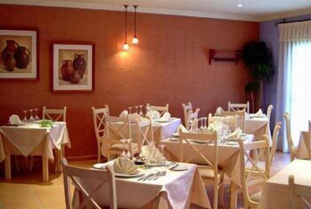 Фото Aparthotel La Espadaña