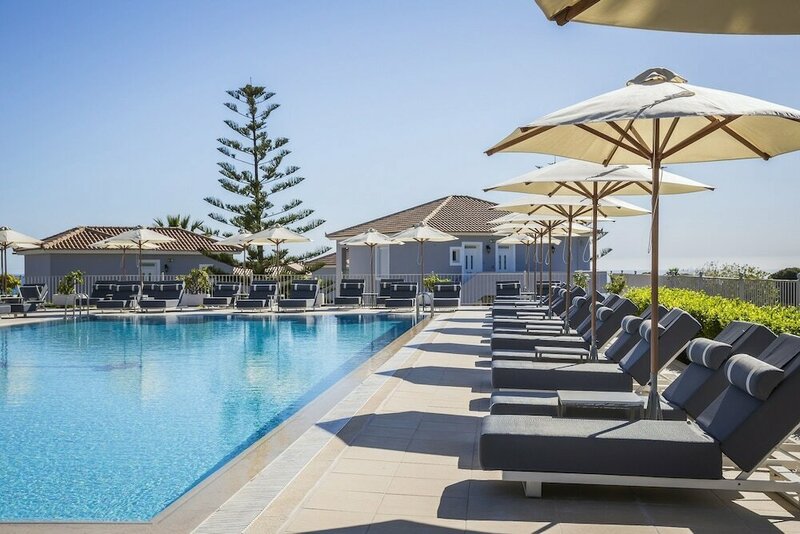 Апартаменты Astra Village Hotel Suites
