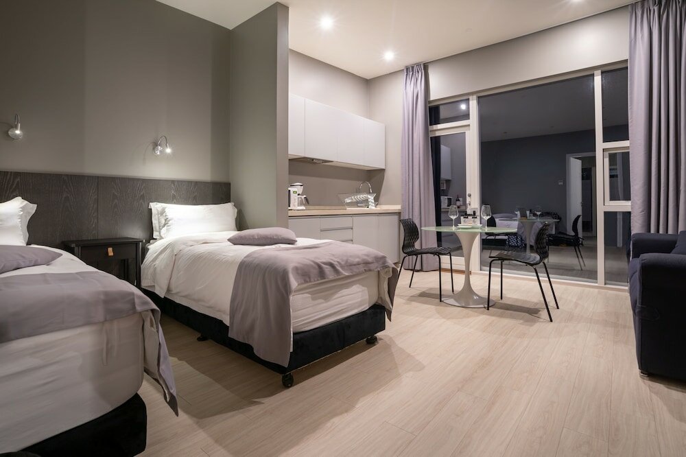 Фото Black Beach Suites