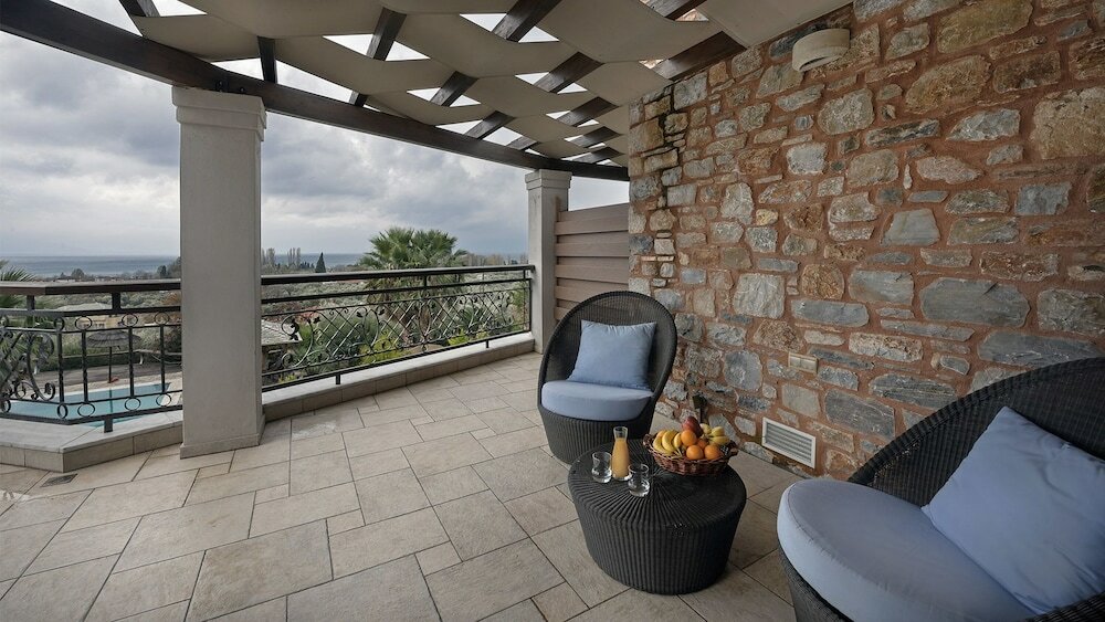 Фото Iakovakis Suites & SPA