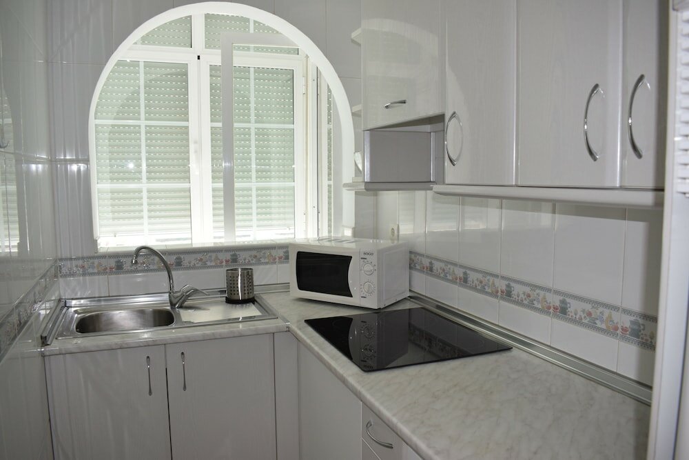 Фото Apartamentos El Jardin