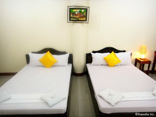 Гостиница Amerson Pension Place - Hostel в Пуэрто-Принсесе