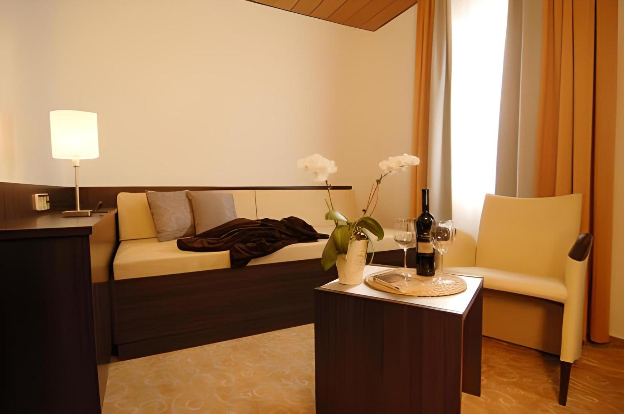 Фото Garni-Hotel Adler