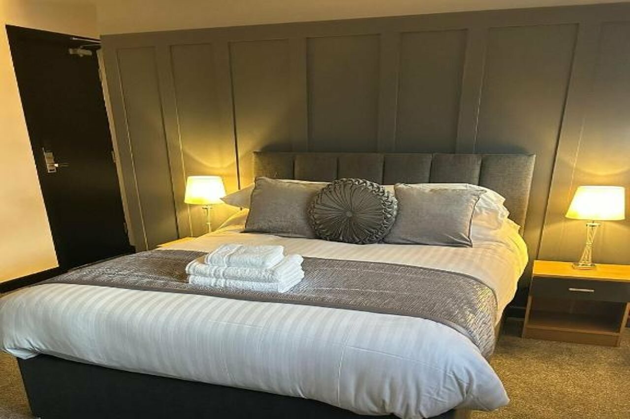 Фото Woodhouse Hotel