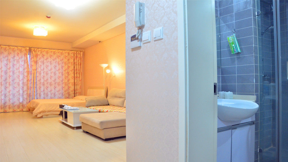 Фото China Sunshine Apartment Dacheng International