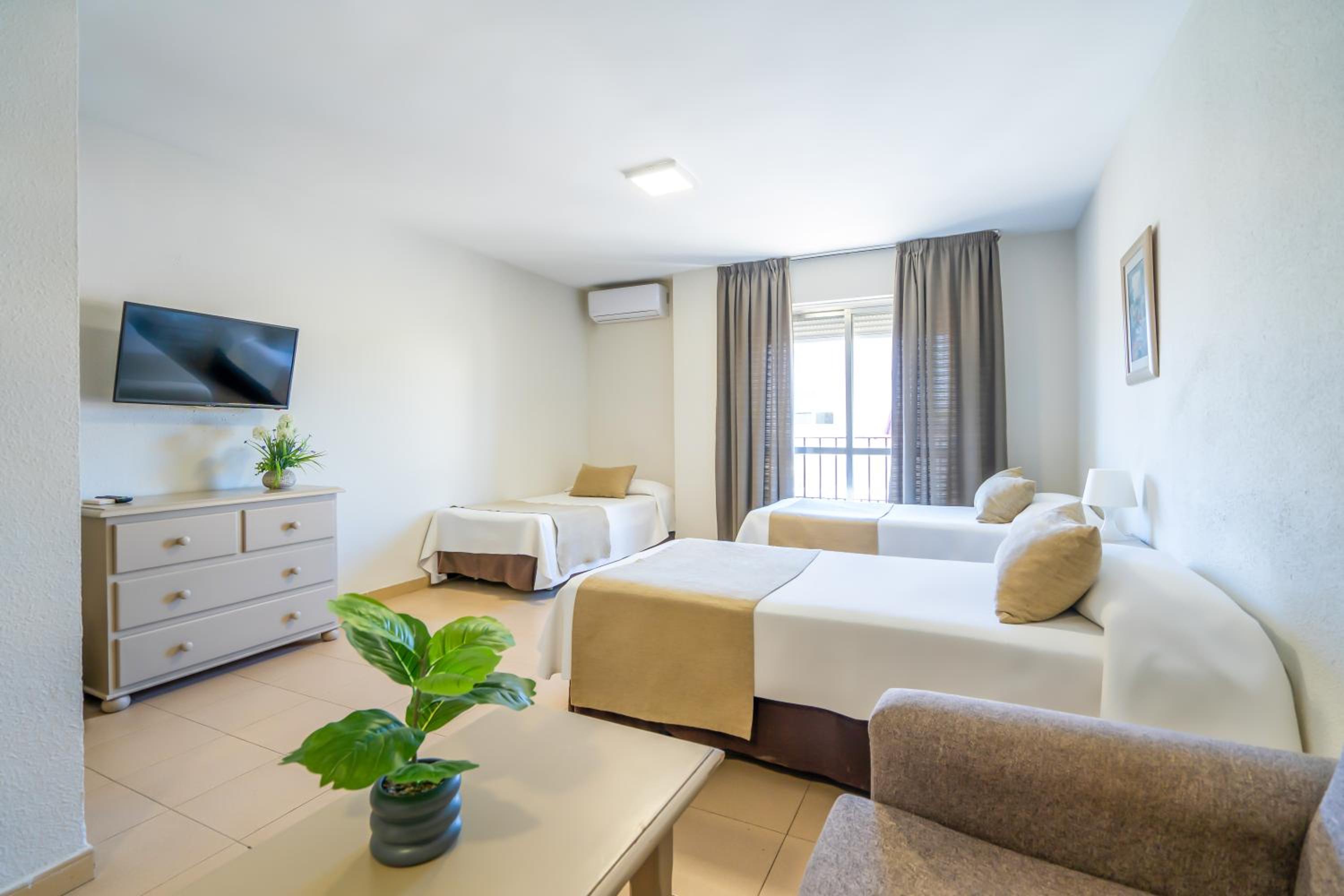 Фото Apartamentos Puerta del Sur