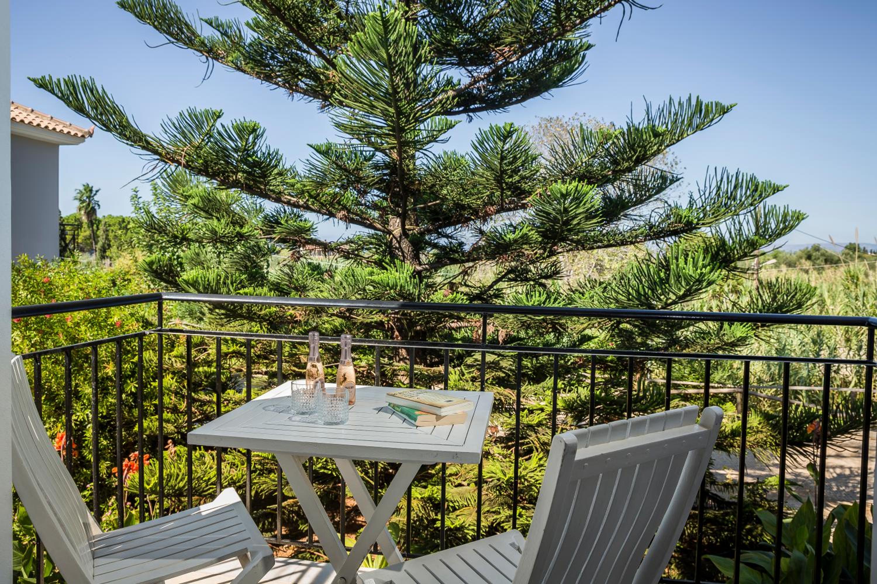 Фото Astra Village Hotel Suites