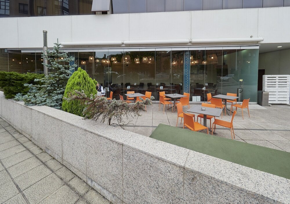 Фото Hotel Silken Ciudad Gijon