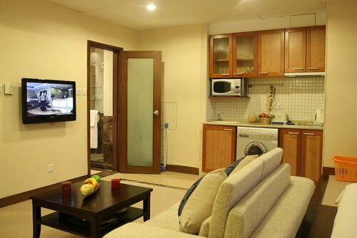 Гостиница Dalian Asia Pacific Service Apartment в Китае