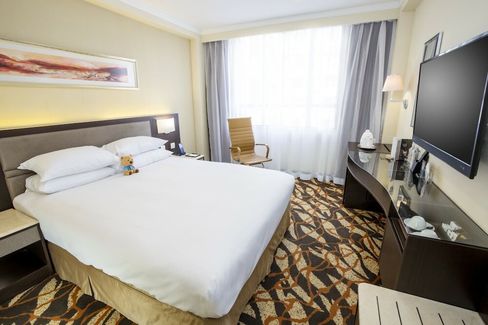 Фото Metropark Hotel Kowloon