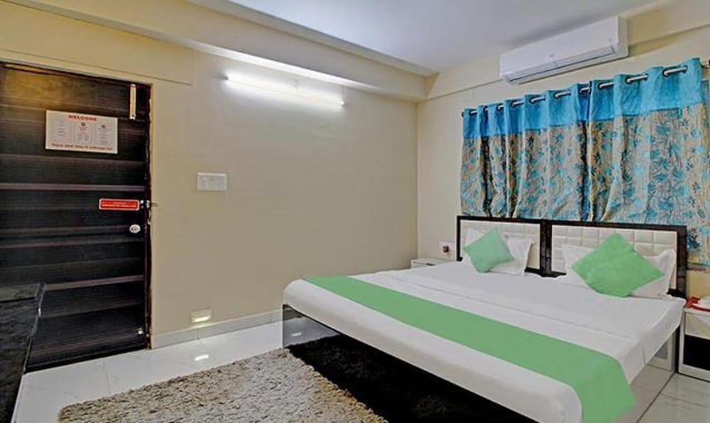 Фото Fabhotel Ashraya Inn