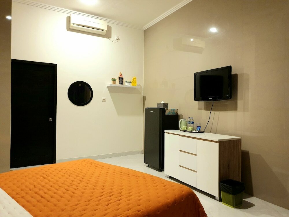 Фото Comfy Room in Piliau Residence