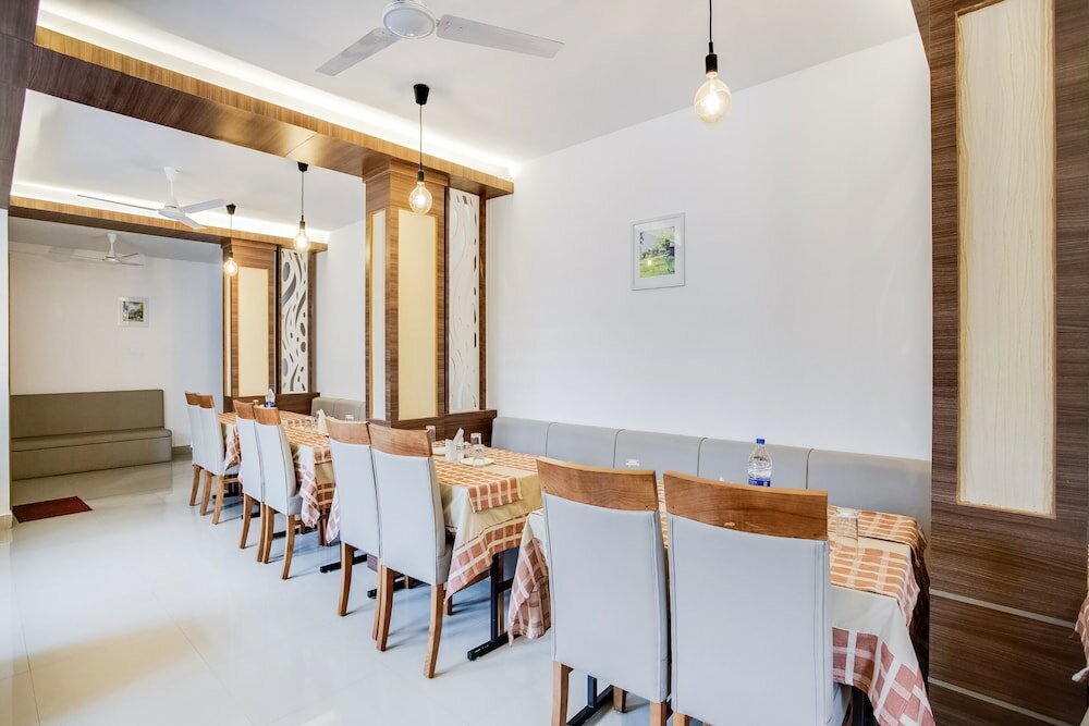 Фото Capital O 60558 Hotel Midhuna International