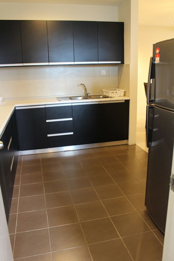 Фото Peaceful Service Suites at Taragon Puteri Bintang