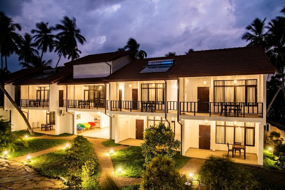 Фото Green Parrot Beach Resort