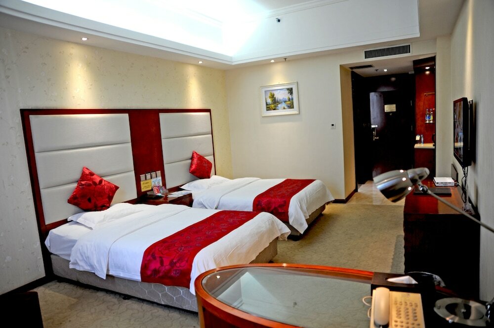 Фото Dinis Business Hotel Kaiyuan Branch