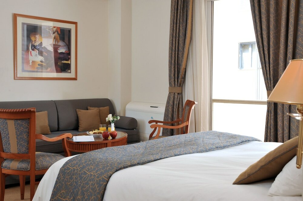 Фото Athens Atrium Hotel and Suites